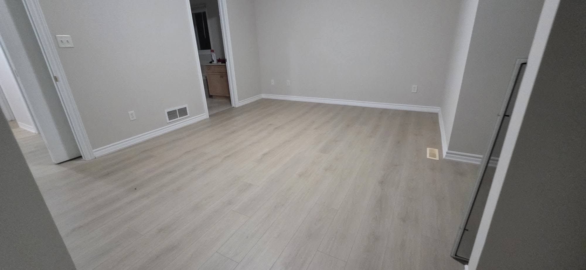 Light wood-look plank flooring in a finished room