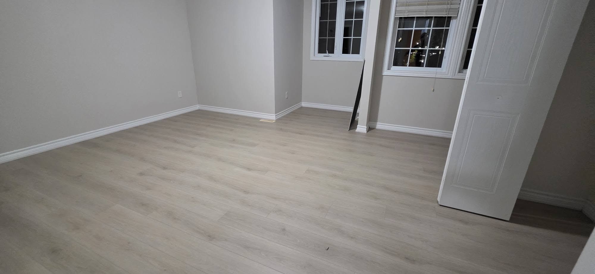 Elegant light wood-look flooring installed by B&M Mourad Group Inc.